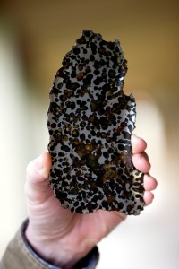 Robert Ward holds a meteorite